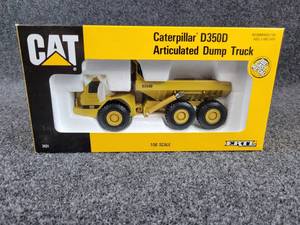 lot 26 image: ERTL Caterpillar D350D Articulated Dump Truck Die Cast 150 Scale in Original Box 1990 Collectors Edition