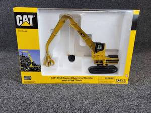 lot 27 image: NORSCOT Scale Models Caterpillar 345B Series II Material Handler Scrap Handler w Grapple and Magnet Attachments - 150 Scale In Original Box - Part No. 55080