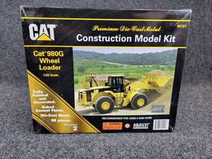 lot 34 image: NORSCOT Scale Models Caterpillar 980G Wheel Loader - 150 Scale 88 Piece Die Cast Model In Original Box - Part No. 55121