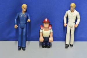lot 16 image: Tonka Medic Action Figure, Tonka, Piolet Action Figure, and Fisher Price Husky Helper Fireman