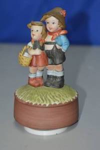 lot 51 image: German Boy & Girl music box