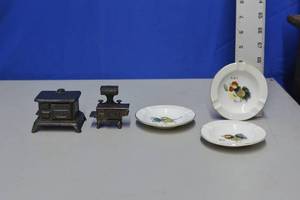 lot 60 image: Metal Stove Pencil Sharpener, Cast doll house size stove, 3 porcelain Chicken Ashtrays