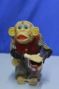 lot 68 image: Cragstan Tin Crap Shooting Monkey