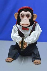 lot 69 image: Charley The Cymbal Playing Chimp