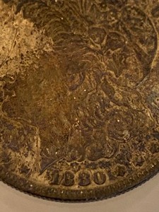 lot 47 image: 1880 Morgan Coin (made into a pendant)