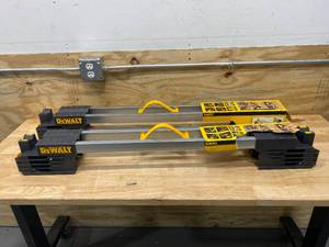 lot 73 image: DEWALT Lot of 2- 32 in. Metal Folding Sawhorses
