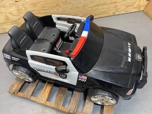 lot 155 image: DODGE CHARGER Battery Operated Kids Police Car