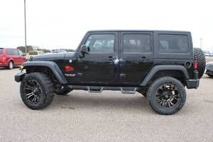 lot 1 image: 2013 Jeep Wrangler Unlimited Sport - 4X4 - 6-Speed Manual