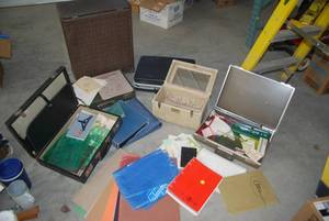 Vintage suitcases some containing d...