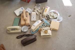 Lot of vintage telephones and acces...