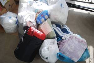 Large lot of bedding includes down ...