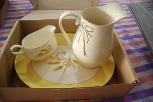 Gold trim wheat pattern servingware...