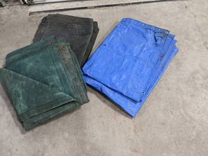 (2) Material and one vinyl Tarps...