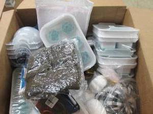 box of ice cube trays , pillow cove...