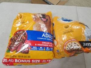 2 bags of dog food both have been o...