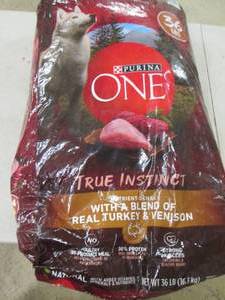36lbs of purina one dog food ...