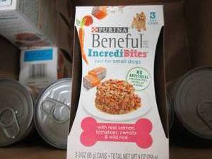 box of canned dog food and 20 bags ...