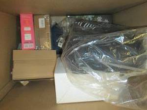 box of clothes, shower curtain knif...