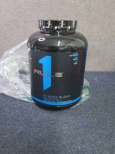 lot 10 image: Rule 1 4.96 lb Container Whey Blend...