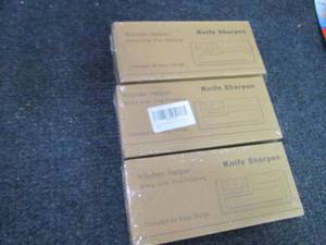 lot 18 image: 3- Kitchen Helper Knife Sharpeners...