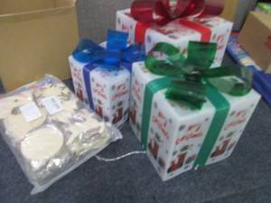 lot 23 image: Nesting Lit Christmas Presents, Woo...