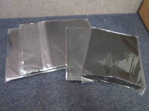 lot 28 image: 4- 2pks Black Mouse Pads...