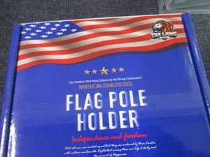 lot 125 image: Lion Stainless Steel Flag Pole Hold...