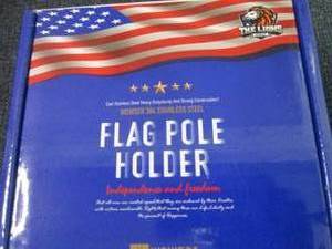 lot 126 image: Lion Stainless Steel Flag Pole Hold...