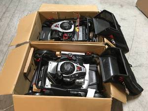 Lot of 2 of 21 in. 140 cc Briggs and Stratton Walk Behind Gas Push Lawn Mower with Height Adjustment and Prime N Pull Start by Murray Customer Returns See Pictures
