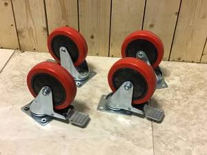 Lot of 4 5 in. Red TPU Heavy-Duty Swivel Plate Caster with Brake, 330 lbs. Weight Capacity by Everbilt Customer Returns See Pictures