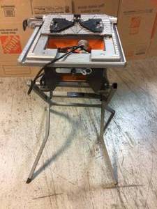 6.5 Amp Corded 7 in. Table Top Wet Tile Saw with Stand by RIDGID Customer Returns See Pictures