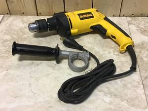7.8 Amp Corded 12 in. Variable Speed Reversible Hammer Drill by DEWALT Customer Returns See Pictures