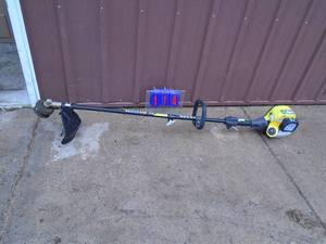 Ryobi 4 cycle weed trimmer. Can be used with other attachments. Tested & works. As shown.