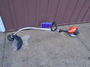Echo gas powered weed trimmer. Lightly used. As shown.
