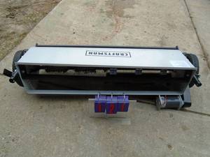 Craftsman 42 12 volt power lawn sweeper. Head unused. Has bad wheel. No other parts. As shown.