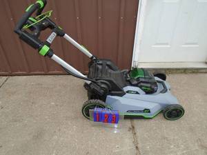 E-Go 56 volt cordless self propelled lawn mower. Looks lightly used. No battery or charger. Unable to fully test. As shown.