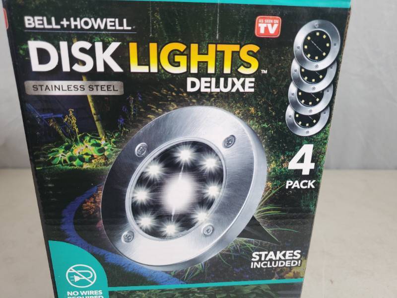 lot 44 image: New Bell and Howell Disk Lights Deluxe