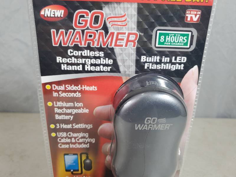 lot 64 image: New Go Warmer Cordless Rechargeable Hand Heater