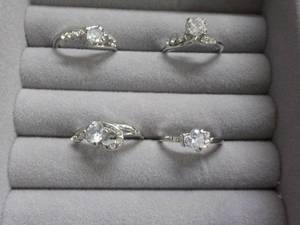 lot 130 image: 4 Cubic Zirconia Rings size 7 - 8...