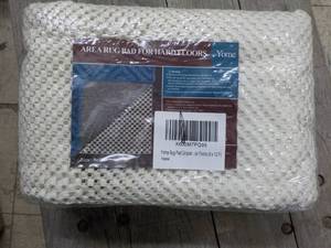 lot 225 image: 9 ft x 12 ft Rug Pad...
