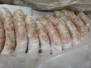 lot 264 image: 10 lb. Box Frozen Doms Sausage...