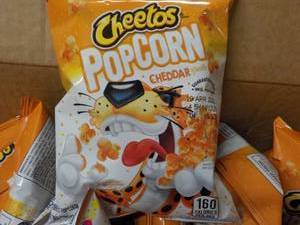 lot 281 image: Case of Cheetos Popcorn Cheddar pa...