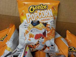 lot 283 image: Case of Cheetos Popcorn Cheddar pa...