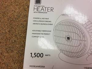 lot 115 image: Warm wave portable fan NEW