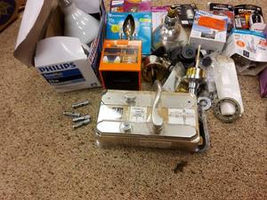 lot 30 image: Bulk lot of light bulbs and other hardware