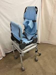 lot 30 image: MSRP $2400 Columbia Medical Ultima Rolling Shower Chair Large Child Size Reclining & Multi adjustable With Back Up Wheels - Great Condition