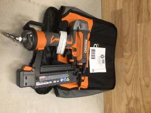 RIDGID Pneumatic 18-Gauge 2-18 in. Brad Nailer with CLEAN DRIVE Technology, Tool Bag, and Sample Nails Open box