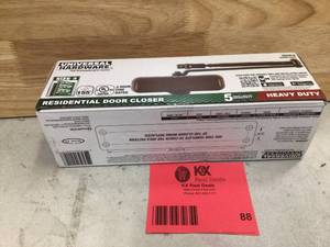 lot 88 image: Universal Hardware Heavy-Duty Brown Residential Door Closer