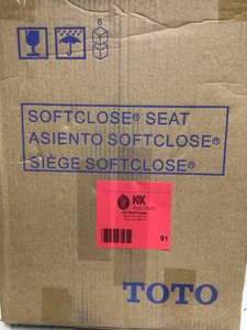 lot 91 image: TOTO SoftClose Elongated Closed Front Toilet Seat in Cotton White