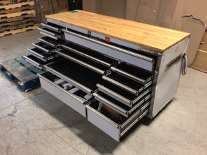 lot 107 image: Husky 72 in. W x 24 in. 18-Drawer Standard Duty Mobile Workbench Tool Chest with Solid Top  in Stainless Steel Customer Return see pictures